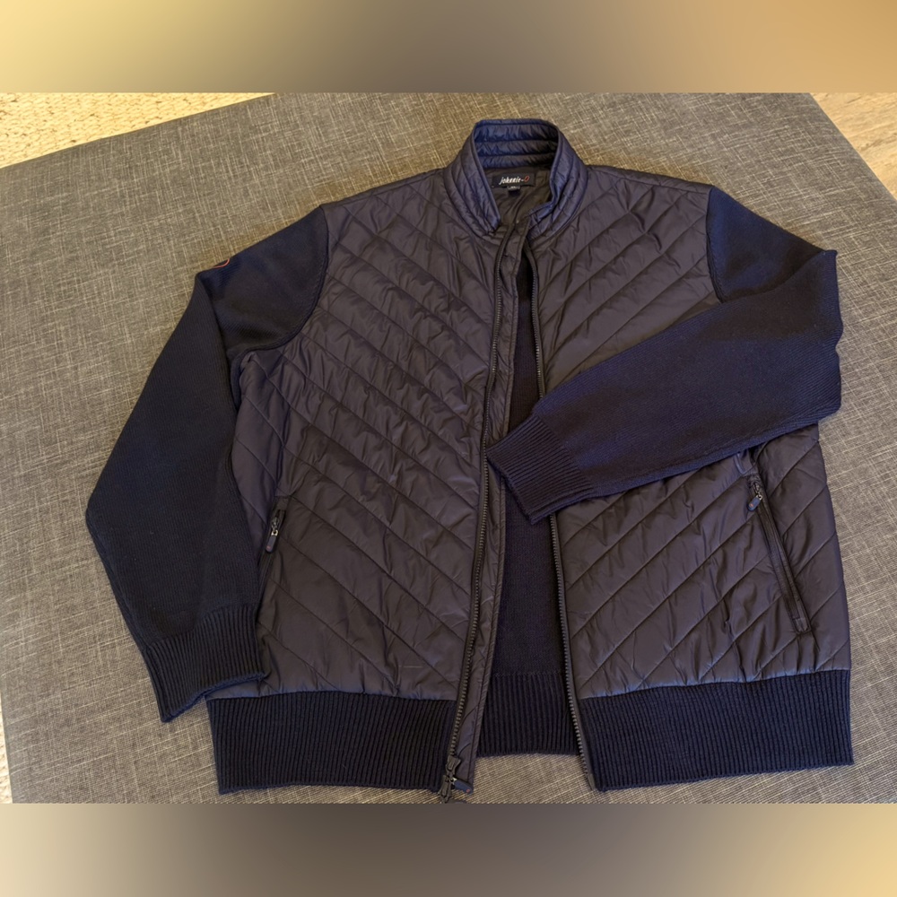Johnnie-O, brand new men’s navy hybrid jacket, nylon/Merino wool. Size XL.
